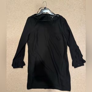 Black long sleeved dress with bell sleeves and button detail new with tags